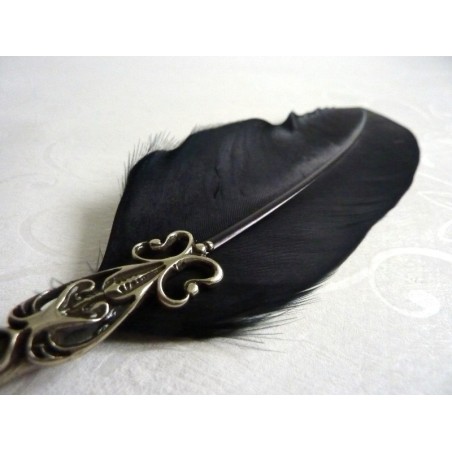 close-up of Bortoletti black classic quill set82 with bronze friezes