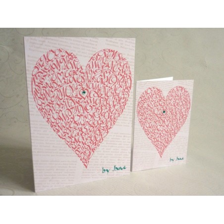 Carta rossa d'epoca del cuore dell'amore fatto a mano con la formulazione di calligrafia in diverse dimensioni