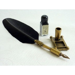 Black feather, pewter quill and stand