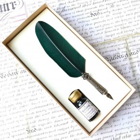 Ornate Feather quill pen and ink