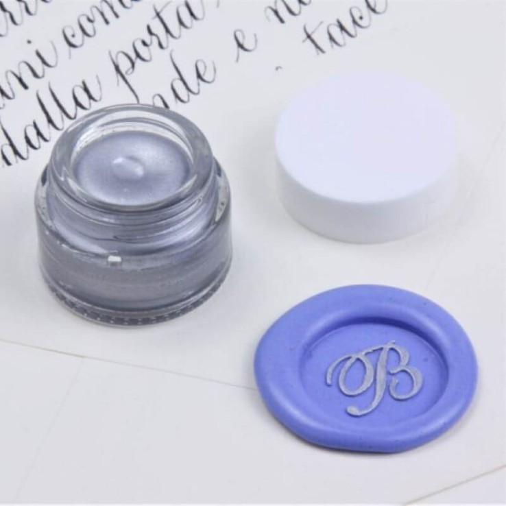 Silver sealing wax cream enhancing raised wax seal detail