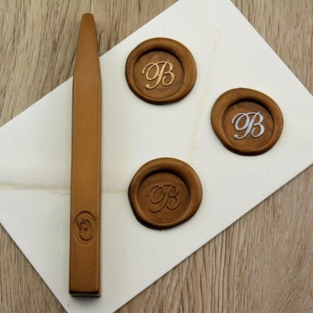 Metallic bronze wax seal impression on envelope