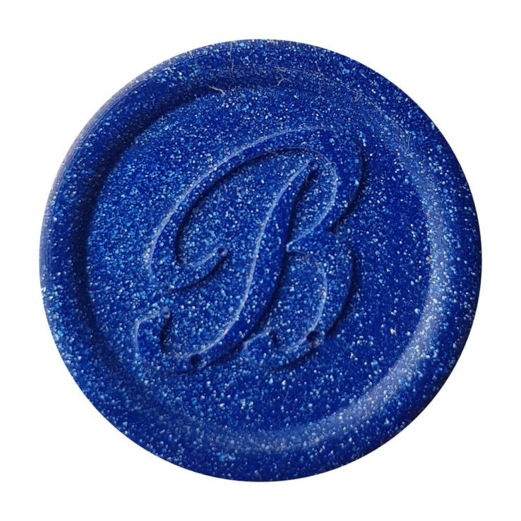 Luxury metallic blue wax seal created with Bortoletti sealing wax