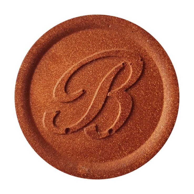 Warm copper wax seal created with Bortoletti sealing wax