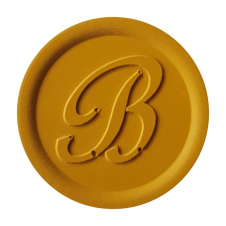 Warm ochre wax seal created with Bortoletti sealing wax
